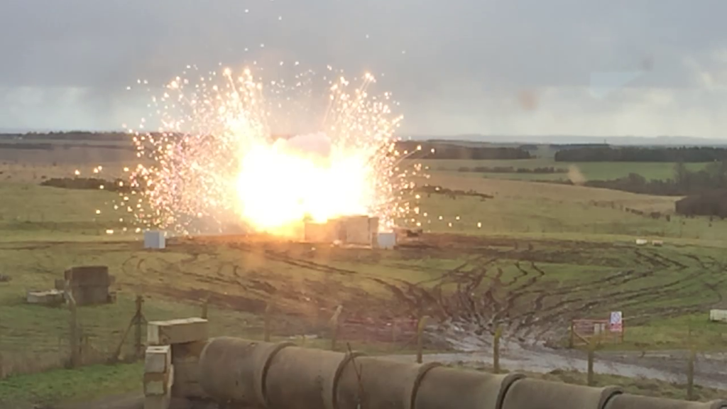 The blast-proof KarabloK hostile vehicle mitigation system being tested against an explosive device